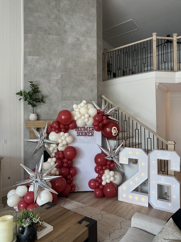Crimson and cream team-colours garland with light-up marquee numbers